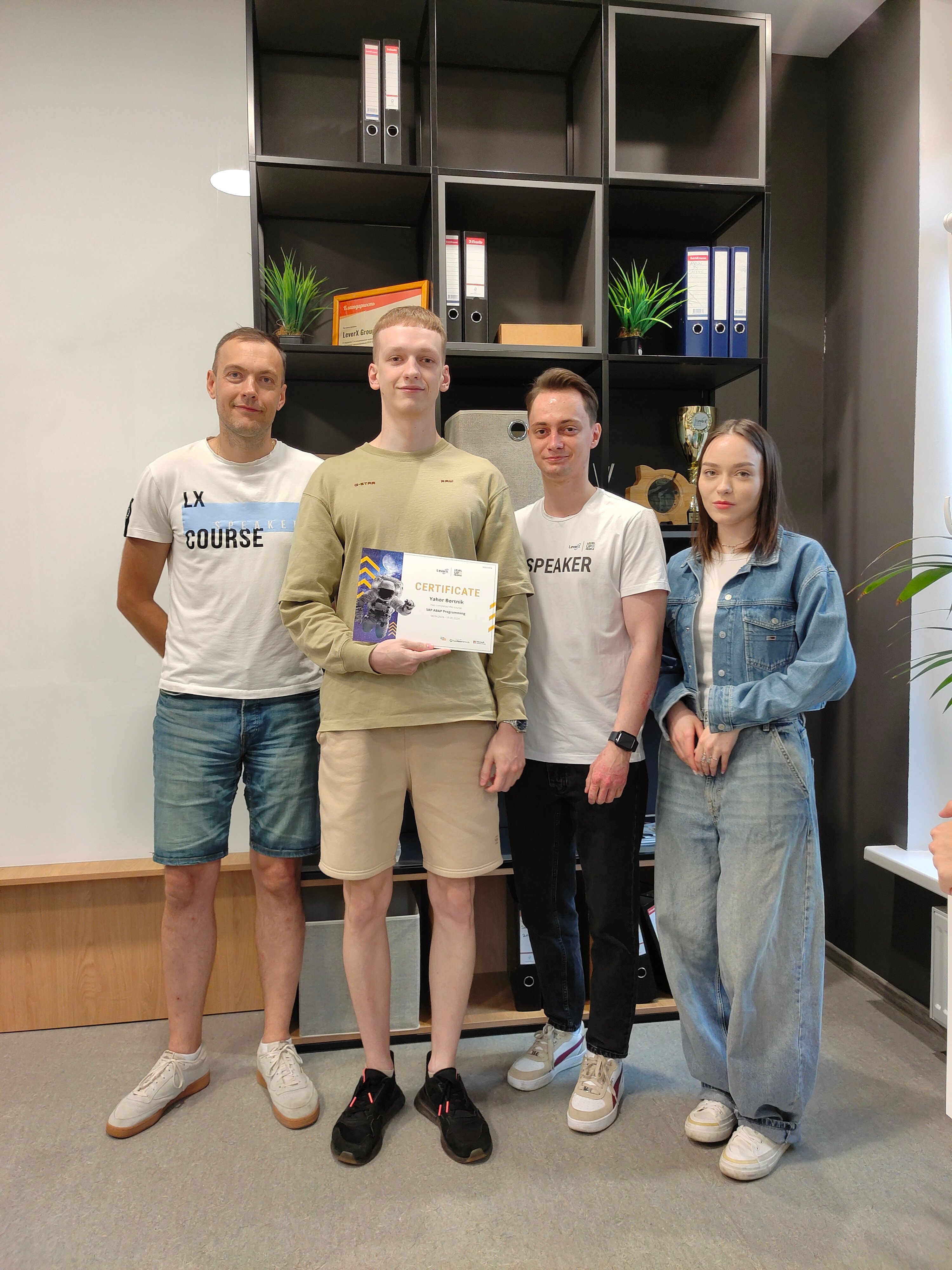 Alina Arlova with Junior ABAP Development course students at the graduation ceremony.